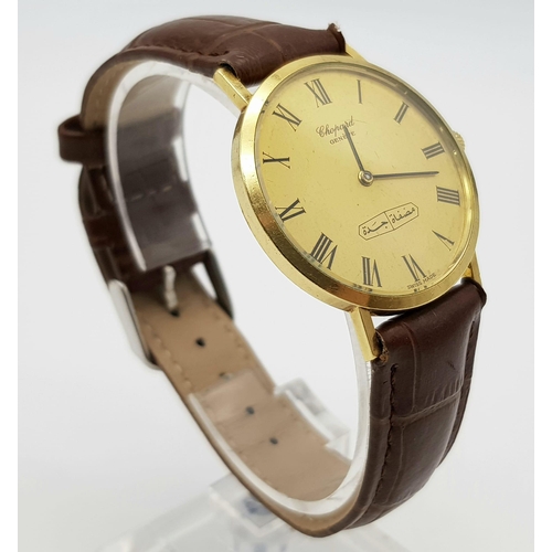 335 - A Vintage Chopard 18K Gold Cased Gents Watch. Brown leather strap. 18K gold case - 33mm.  Gold tone ... 