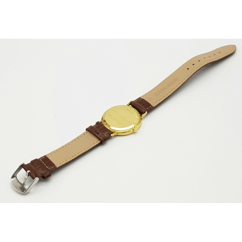 335 - A Vintage Chopard 18K Gold Cased Gents Watch. Brown leather strap. 18K gold case - 33mm.  Gold tone ... 