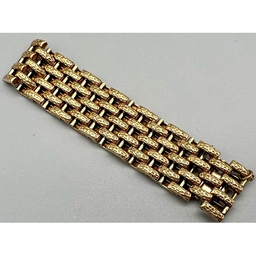 4 - A Vintage 9K Yellow Gold Gate Bracelet. 17cm. 28.21g.