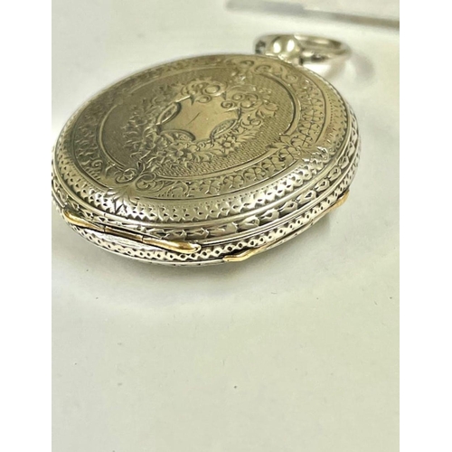 243 - Antique ladies silver pocket watch with stand Working, sold with no guarantee