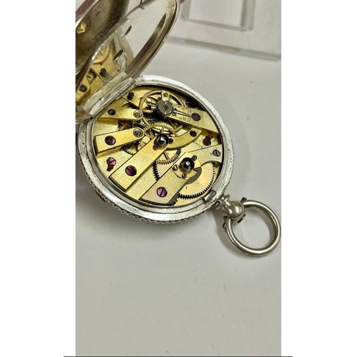 243 - Antique ladies silver pocket watch with stand Working, sold with no guarantee