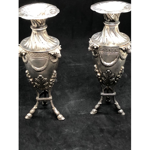 290 - Magnificent 19th century solid silver pair of urn vases 
London import 1906 

Both vases hold clear ... 