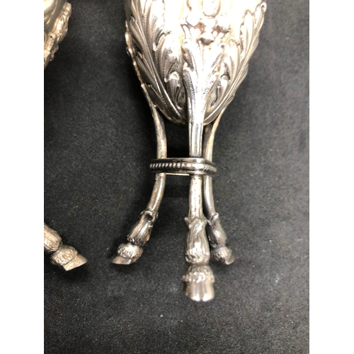 290 - Magnificent 19th century solid silver pair of urn vases 
London import 1906 

Both vases hold clear ... 