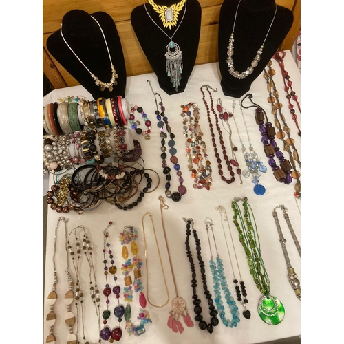 299 - Tabletop full of quality NECKLACES,BRACELETS and BANGLES. To include marks and spencer,next, etc.Ple... 