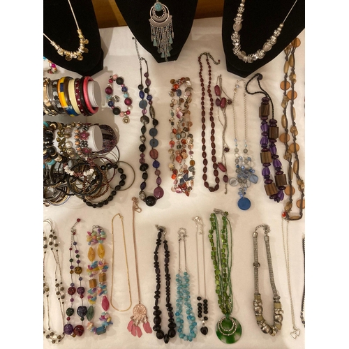 299 - Tabletop full of quality NECKLACES,BRACELETS and BANGLES. To include marks and spencer,next, etc.Ple... 