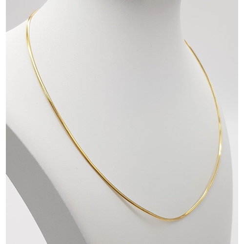 58 - An 18K Yellow Gold Italian Snake-Skin-Link Necklace. 46cm. 
5.5g total weight.