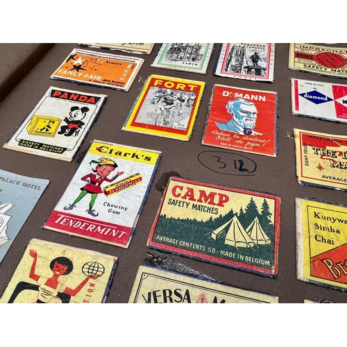 463 - A scrapbook dated 1955 of Matchbox covers. Around 400 covers from all over the world with some very ... 