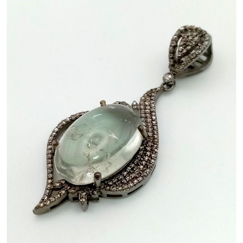 394 - Intricately designed Green Amethyst Pendant adorned with Rose cut diamonds. Green Amethyst - 16.45ct... 