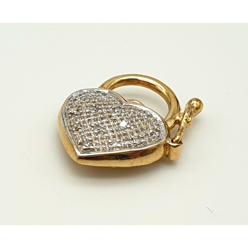 817 - A 9K Yellow and White Gold Diamond Heart-Shaped Pendant. 1.92g. 17mm.