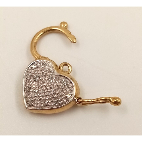 817 - A 9K Yellow and White Gold Diamond Heart-Shaped Pendant. 1.92g. 17mm.