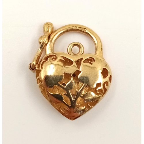 817 - A 9K Yellow and White Gold Diamond Heart-Shaped Pendant. 1.92g. 17mm.