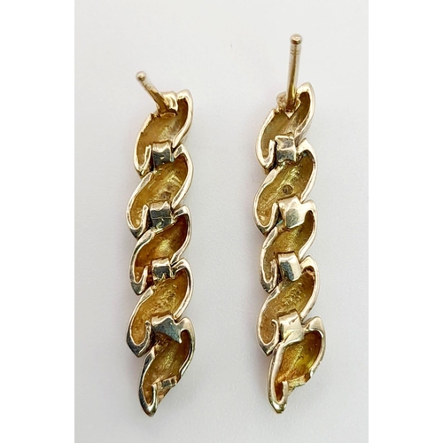 442 - A Pair of 9K Yellow Gold Diamond Braided Drop Earrings.
3cm. 4.91g total weight.