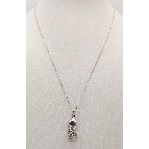 367 - A 9K White Gold Disappearing Necklace with an 18K White Gold Diamond  Pendant. 0.20ct. 44cm. 2cm.
2.... 