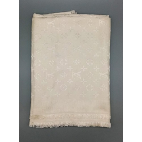 156 - A Louis Vuitton Monogram Shawl, Ivory soft silk-and-wool blend scarf, Metallic monogram print, Size ... 