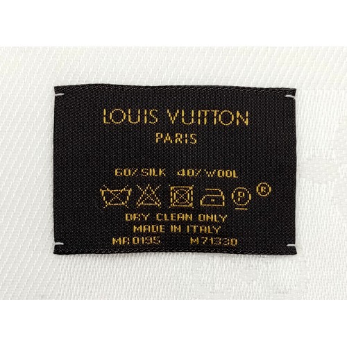 156 - A Louis Vuitton Monogram Shawl, Ivory soft silk-and-wool blend scarf, Metallic monogram print, Size ... 