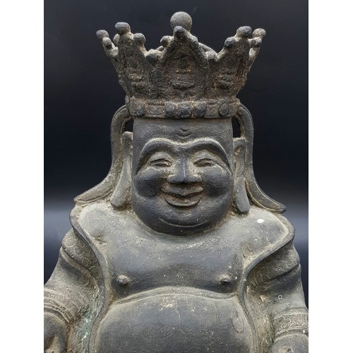 1 - A MING DYNASTY FIGURE OF A BUDAI IN BRONZE (1368-1644) A JOVIAL BRONZE CROWNED FIGURE SEATED IN RAJA... 