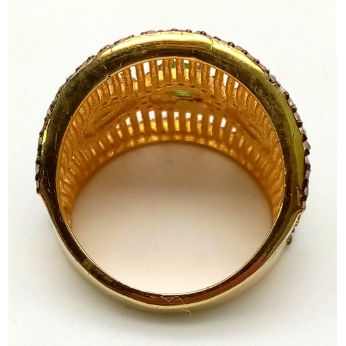 126 - A very unusual, gold and silver ring with 3 Colombian emeralds and over 150 diamonds (tested) on par... 