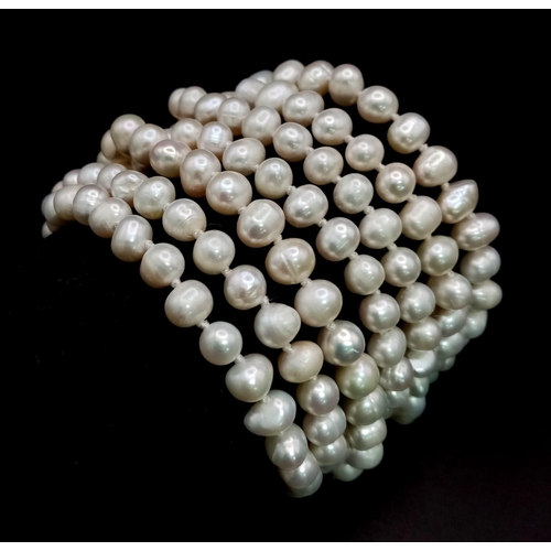 147 - A magnificent, seven row, white pearl, bracelet with an impressive Panther shaped clasp studded with... 