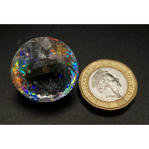 168 - A mesmerising, large (68.25 carats), MYSTIC TOPAZ. Round cut, exhibiting beautiful iridescence, flaw... 