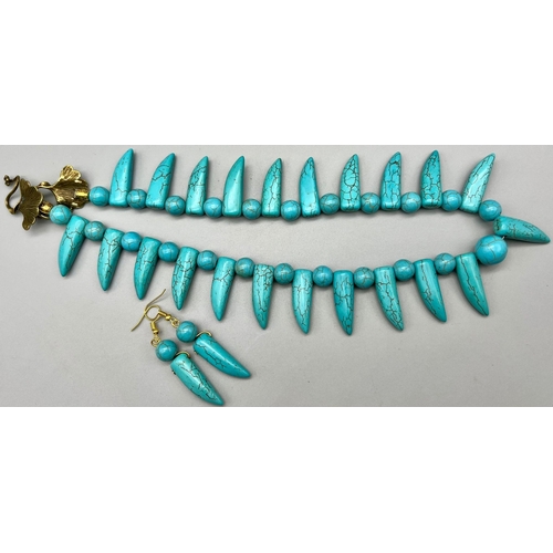 238 - A turquoise regal necklace and earrings set with an Art Nouveau style clasp. Necklace length: 50 cm,... 