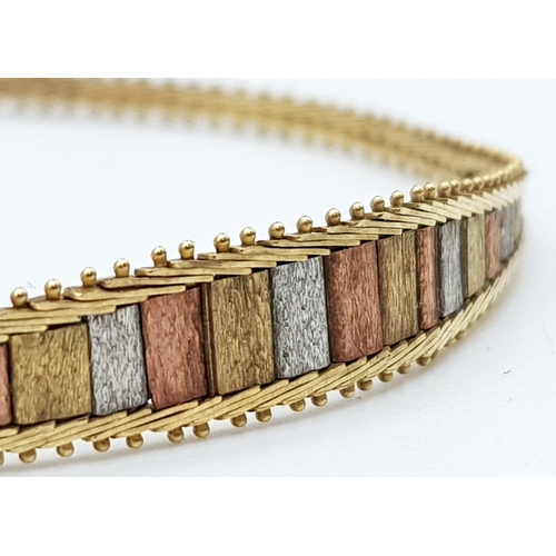 15 - A 9K Tri-Colour Gold Graduating Bar Bracelet. 18cm. 5.74g