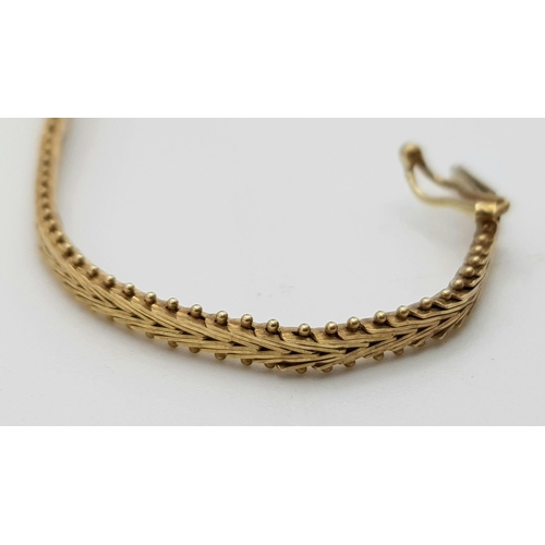 15 - A 9K Tri-Colour Gold Graduating Bar Bracelet. 18cm. 5.74g