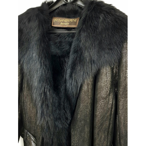 105 - A sophisticated and fashionable YVES SAINT LAURENT real fur lined, knee length, leather coat, crafte... 