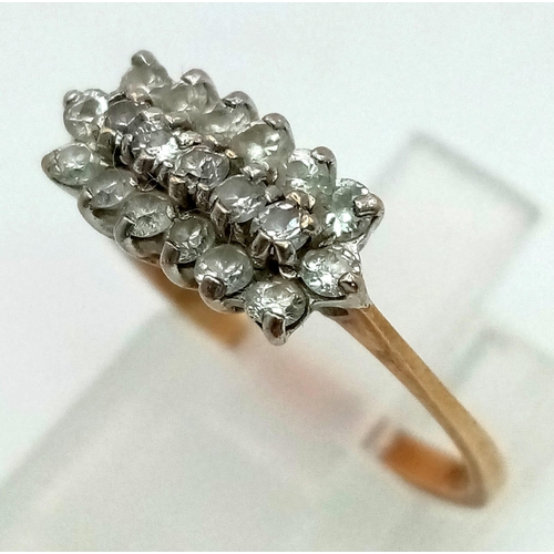 1078 - A 9K Yellow Gold Three-Row White Stone Ring. Size O. 1.83g total weight.