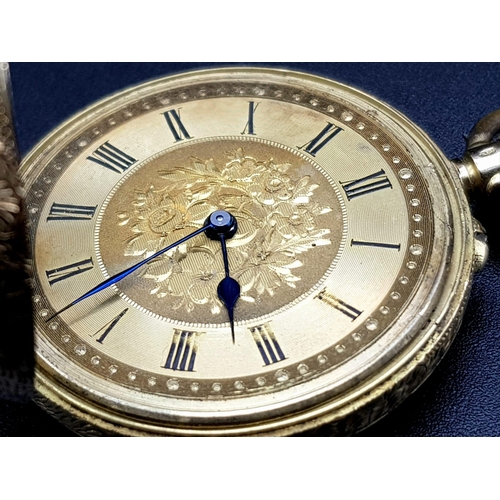 32 - A Beautiful Antique 18K Gold Cased Ladies Pocket Watch. Chased decoration throughout. Inscription fr... 