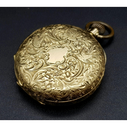 32 - A Beautiful Antique 18K Gold Cased Ladies Pocket Watch. Chased decoration throughout. Inscription fr... 