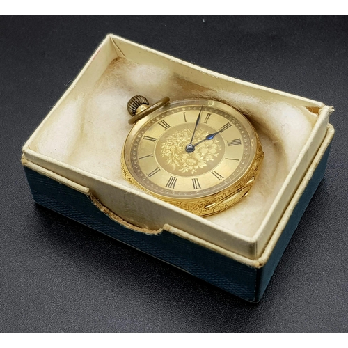 32 - A Beautiful Antique 18K Gold Cased Ladies Pocket Watch. Chased decoration throughout. Inscription fr... 