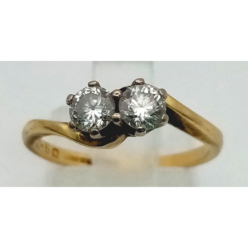 36 - A Vintage 18K Yellow Gold Two Diamond Gemstone Crossover Ring. Two brilliant round cut diamonds - 0.... 