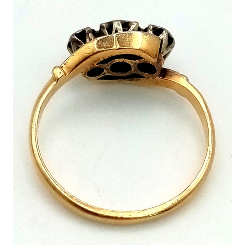 531 - An 18K Yellow Gold, Platinum Three Stone Diamond Ring. Size J 1/2. 2.45g total weight.