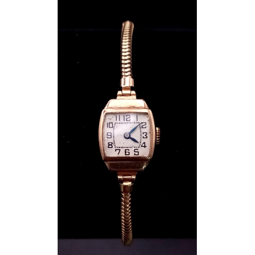 538 - A Vintage 9K Gold Cased Ladies Watch. Mechanical movement in working order but because of age no gua... 