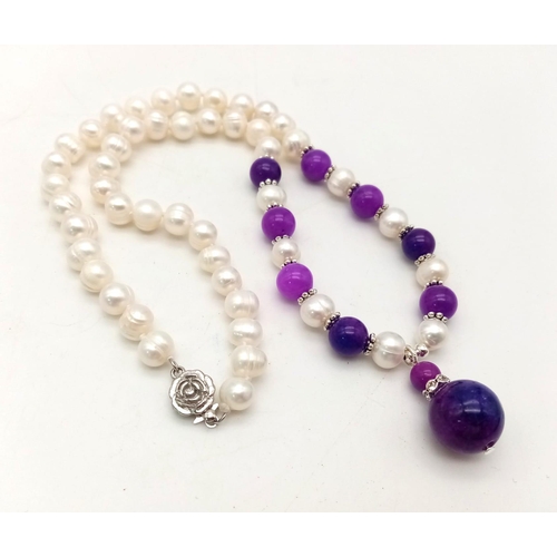 495 - An Akoya Pearl and Purple Sugalite Necklace and Pendant - 25mm. Necklace - 42cm