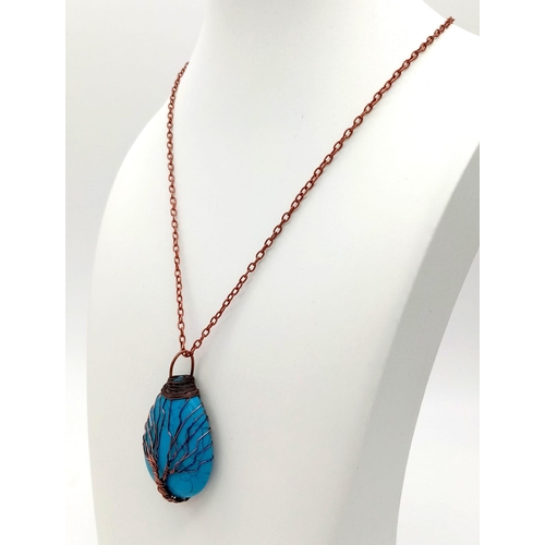 947 - A Turquoise Tree of Life Teardrop Pendant on a Metal Chain. 4cm  and 44cm.