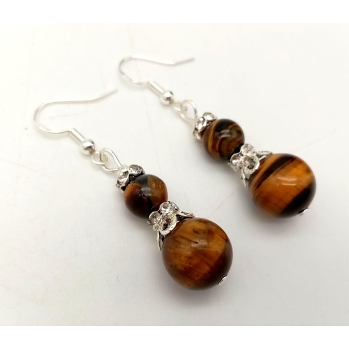 980 - A Pair of Purple Jade and Tigers Eye Drop Earrings.