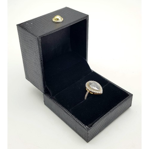 1077 - A 14K Yellow Gold Salt and Pepper 2ct Diamond Teardrop Ring - with a halo and wings of a further  .4... 