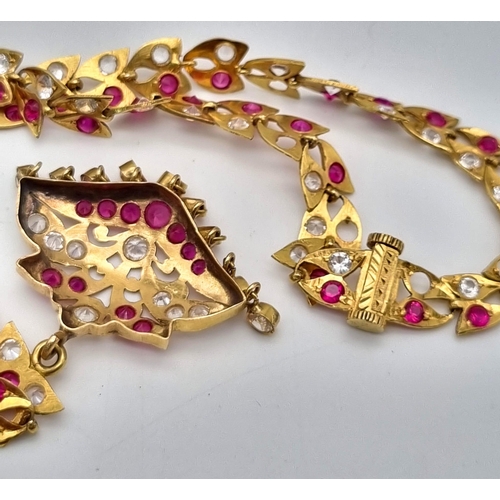 106 - A Mixed High Karat Gold Lot to Include: 2 x 18k gold bangles - 15.86g total weight. A necklace with ... 