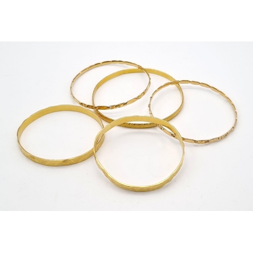 106 - A Mixed High Karat Gold Lot to Include: 2 x 18k gold bangles - 15.86g total weight. A necklace with ... 