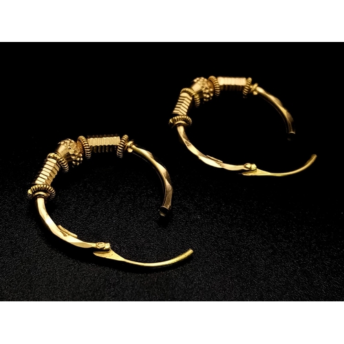 127 - A 22k Yellow Gold Pair of Intricate Hoop Earrings. 4.1g total weight. Ref: 6-884.