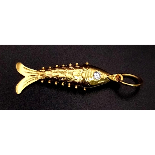 37 - A 22K Yellow Gold Fish Pendant with White Stone Eyes - 3cm and a Flat Link Bracelet - 20cm. 14.8g to... 