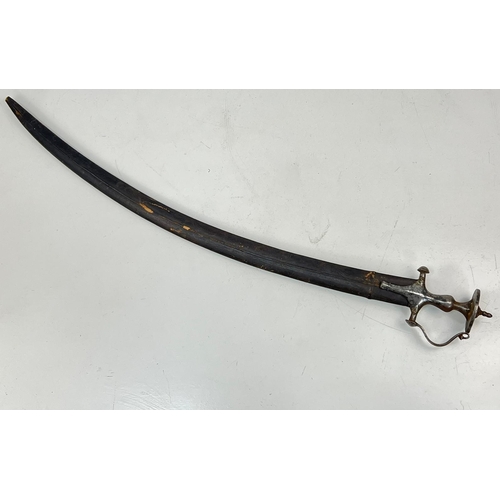 152 - An Antique Military Indian Tulwar Curved Sword and Leather Scabbard. Solid iron hilt with a large di... 