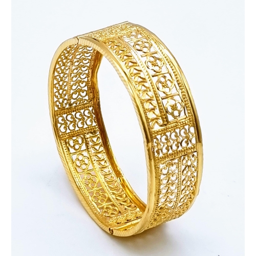 176 - A 22k Yellow Gold Mixed Lot to Include: Three beautifully decorated bangles and an Asian wedding nec... 