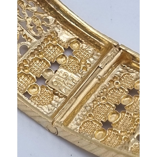 176 - A 22k Yellow Gold Mixed Lot to Include: Three beautifully decorated bangles and an Asian wedding nec... 