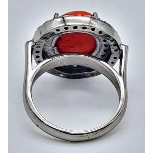 373 - A 3.50cts Natural Coral Ring set in 925 silver decorated with 0.72ct Diamond Accents surround. Size ... 