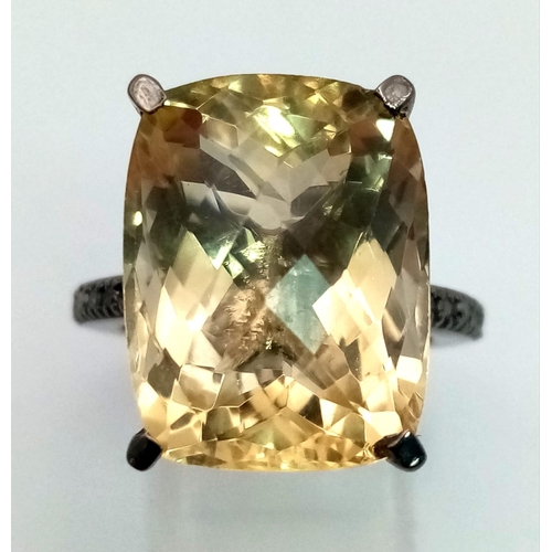 400 - A 14.70ct Natural Citrine Ring set in 925 silver, decorated with 0.28ct Diamond on the wings. Size N... 