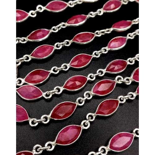 407 - A Marquise cut Ruby link Necklace set in 925 silver. Length: 90.5cm. Total weight: 26.33g