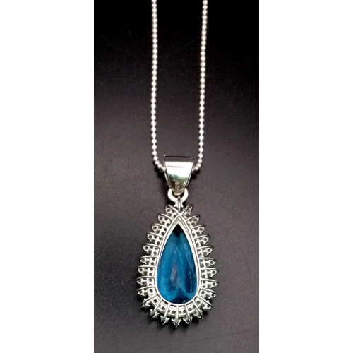 359 - A Natural 10cts Pear cut Blue Topaz Drop Pendant, set in 925 silver decorated with 1.50cts Diamonds ... 