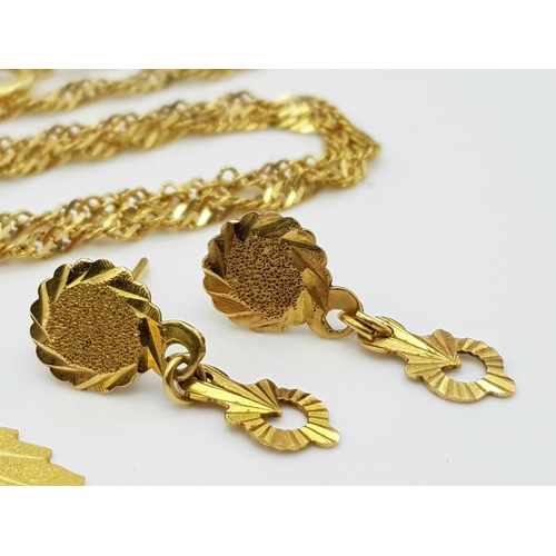 268 - A 20K Yellow Gold Necklace - 40cm and two pairs of 20k yellow gold earrings. Total weight - 6.8g. Re... 